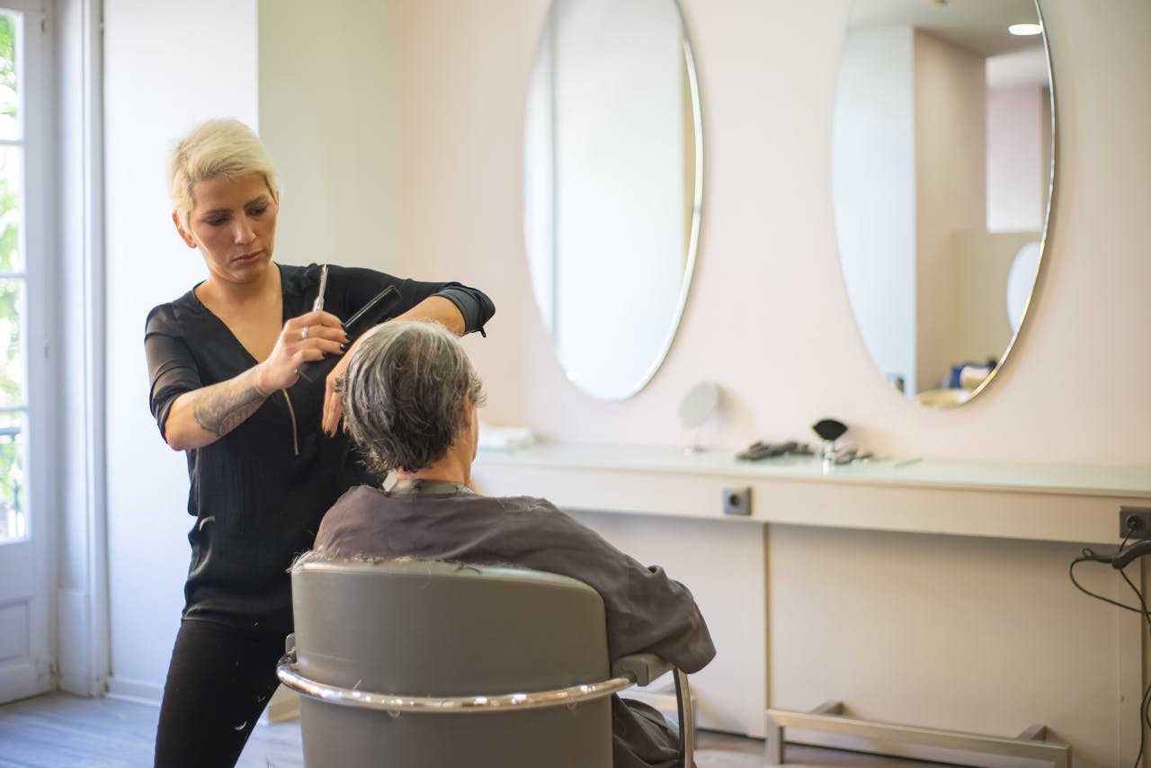 Stylist at work in a bright, modern salon