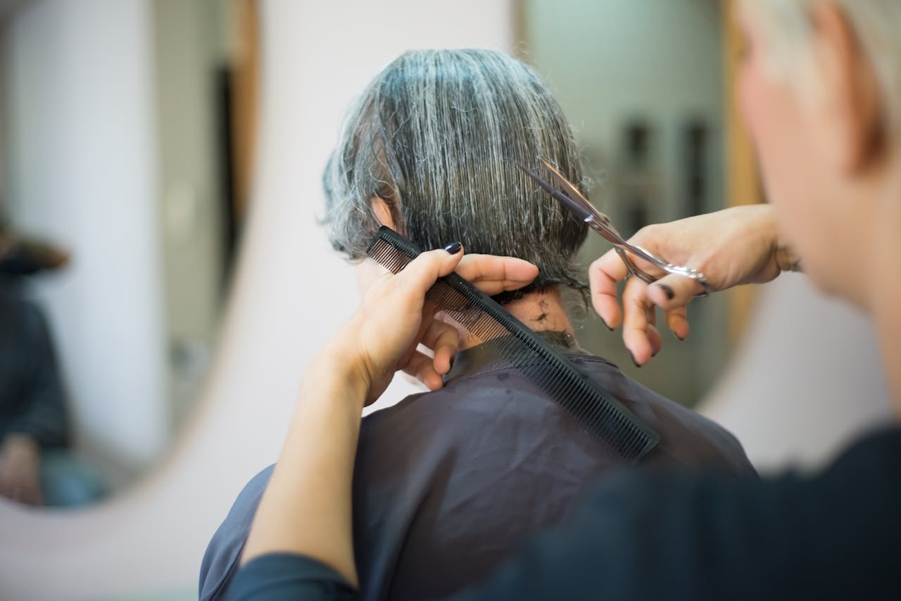 Professional hair styling in a modern salon