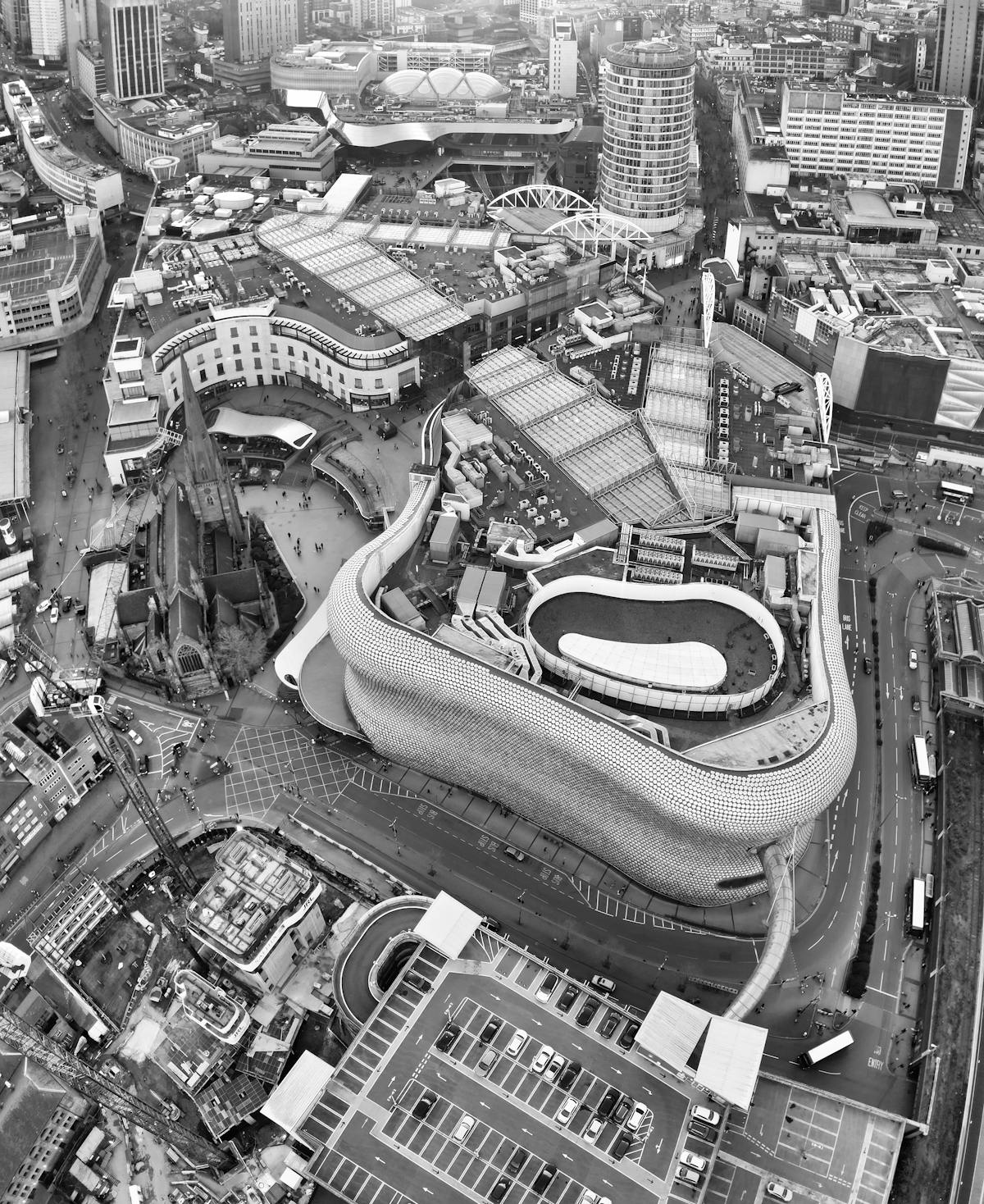 Development team collaborating around a screen