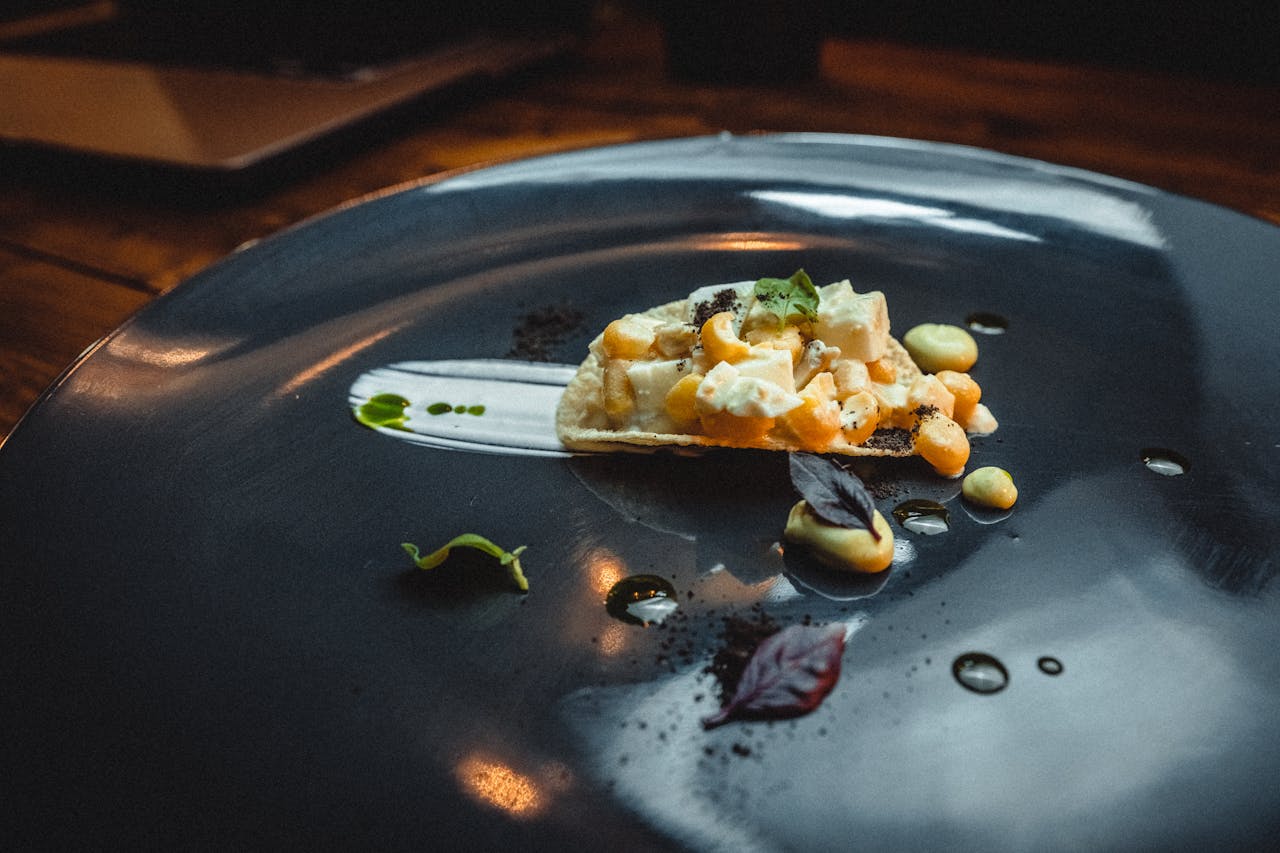 Fresh pizza being prepared in a kitchen