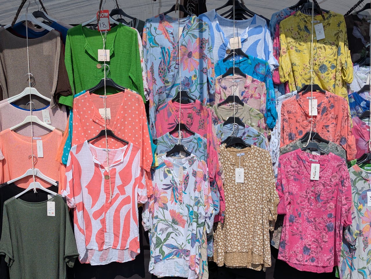 Vibrant collection of patterned garments on display