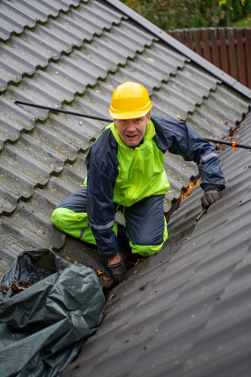Professional tradesperson working with tools on site